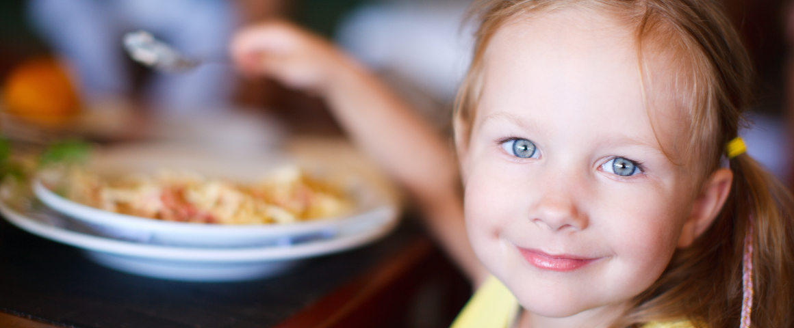 picture of little girl eating